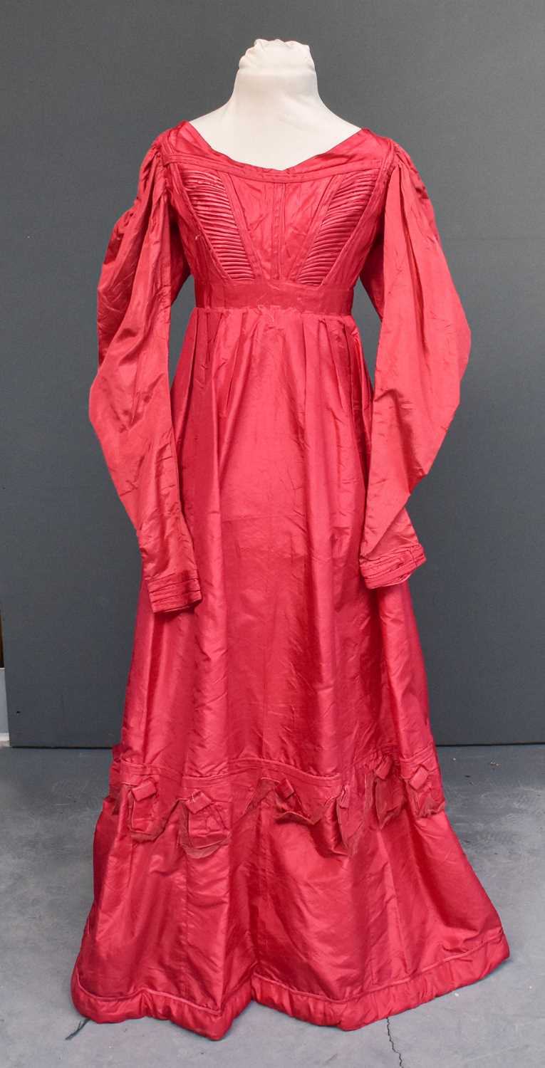 Early 19th Century Cerise Silk Dress, with military style multi pleated panels to the bodice, empire