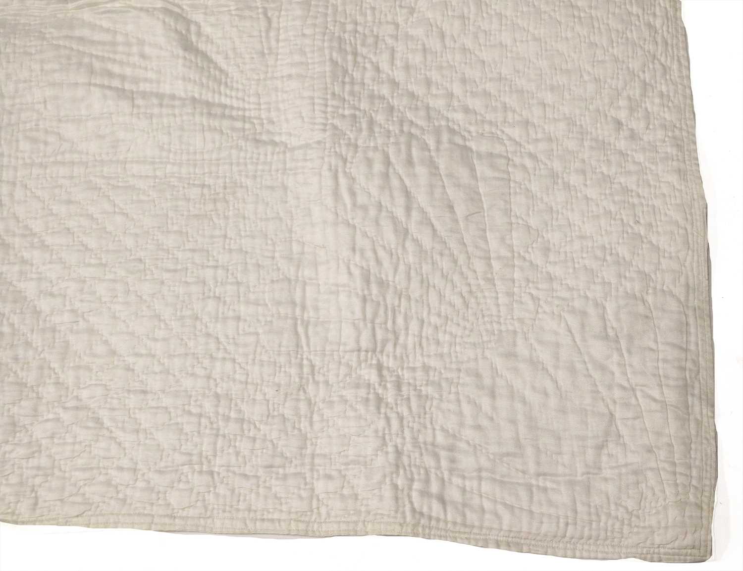 Late 19th Century White Cotton Whole Cloth Quilt, hand quilted with a central circle, flanked by