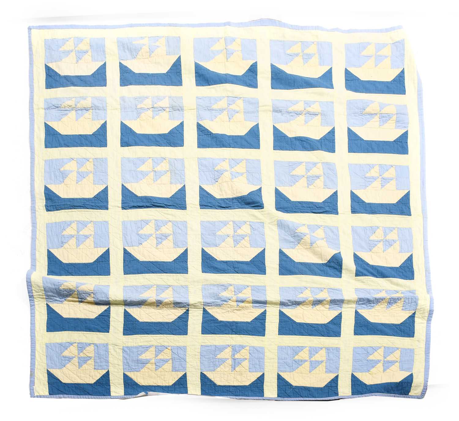 Circa 1935 Canadian Cotton Patchwork Quilt, depicting twin mast sailing boats within squares in pale