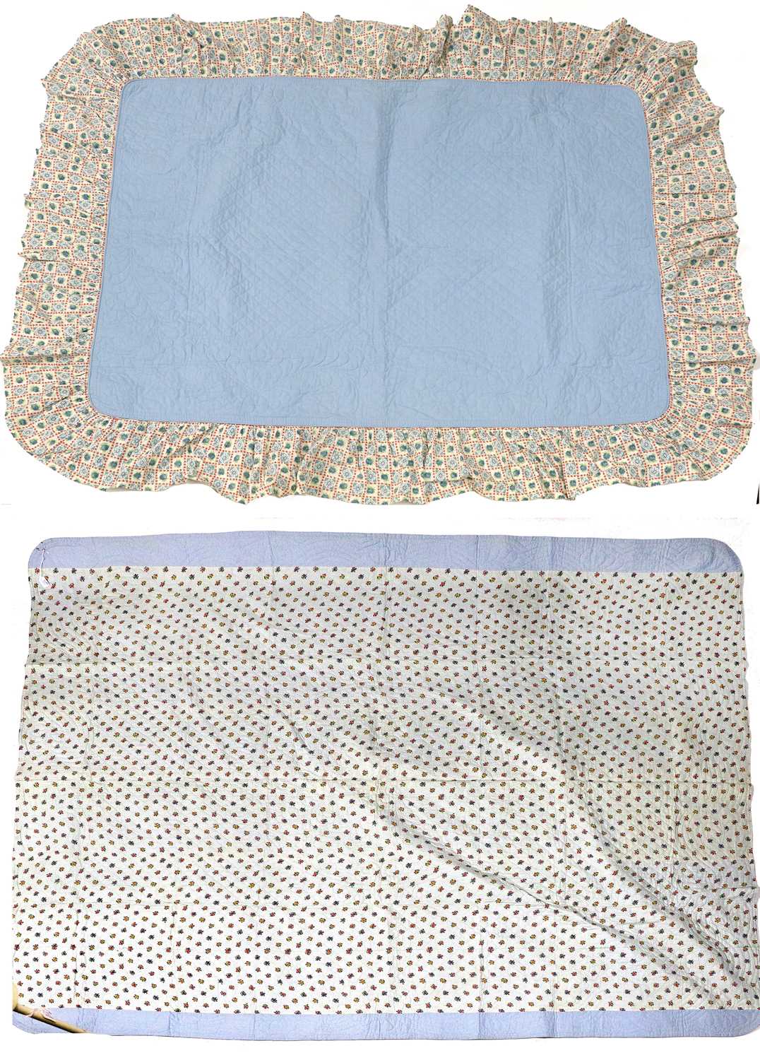 20th Century Reversible Whole Cloth Quilt, with a pale blue cotton to one side and floral sprigged