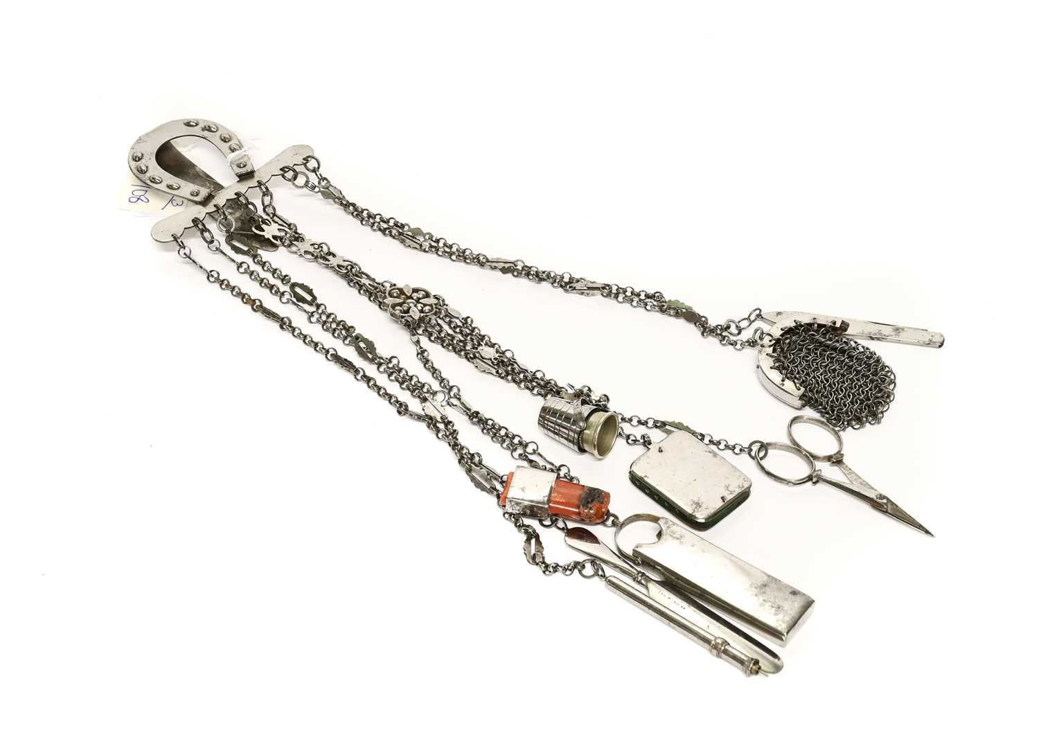 Late 19th Century Cut Steel Chatelaine, with horseshoe mount to the clip hung with seven