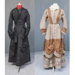 A Late 19th Century Brown Dress, with lace trimmed round neck, buttons to the bodice and top of