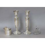 A Collection of Assorted Silver, comprising a pair of candlesticks, filled, 21.5cm high; a George IV