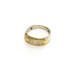 A Diamond Five Stone Ring, the graduated round brilliant cut diamonds in a yellow channel setting,