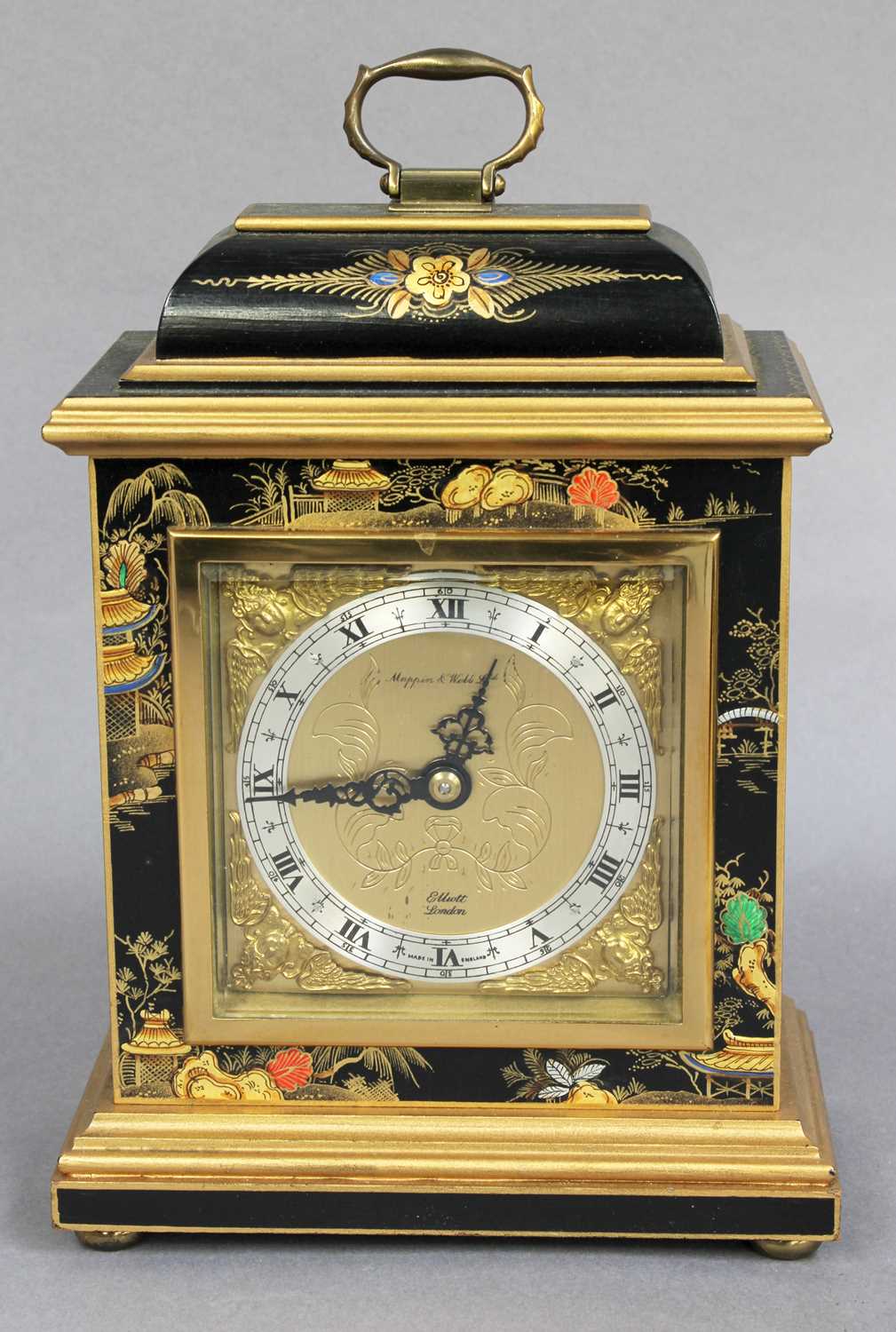 A Black Japanned Mantel Timepiece, dial signed Elliott London and retailed by Mappin & Webb Ltd,