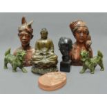 A Bronzed Metal Figure of Buddha, a pair of jade-type figures of Dogs of Fo, a pair of Indonesian