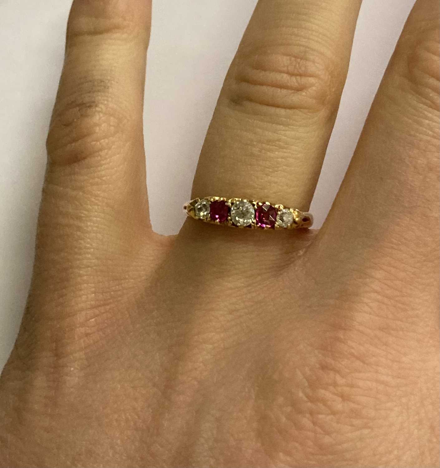 An 18 Carat Gold Ruby and Diamond Five Stone Ring, finger size PThe ring is in good condition. It is - Image 4 of 5