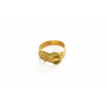 An 18 Carat Gold Buckle Ring, finger size VGross weight 7.1 grams.