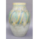 A Pilkingtons Lancastrian Vase, of ovoid form and decorated in tones of yellow, blue an green,