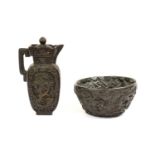 A Chinese Ewer, Cover and Basin, the ewer of flattened ovoid form carved with flowering branches