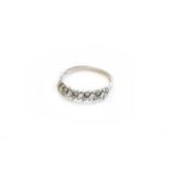 An 18 Carat White Gold Diamond Half Hoop Ring, five rectangular step cut diamonds alternate with