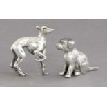 An Italian Silver model of a Greyhound, 43mm high; Together With a silver plate dog ornament (2)