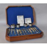 A Collection of Assorted Silver, including two engine-turned cigarette-cases; four napkin-rings