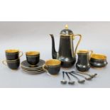 A Royal Worcester Part Coffee Service, black ground and gilt, together with a set of five silver and