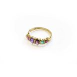 An 18 Carat Gold 'REGARD' Ring, the graduated ruby, emerald, garnet, amethyst, ruby and diamond in