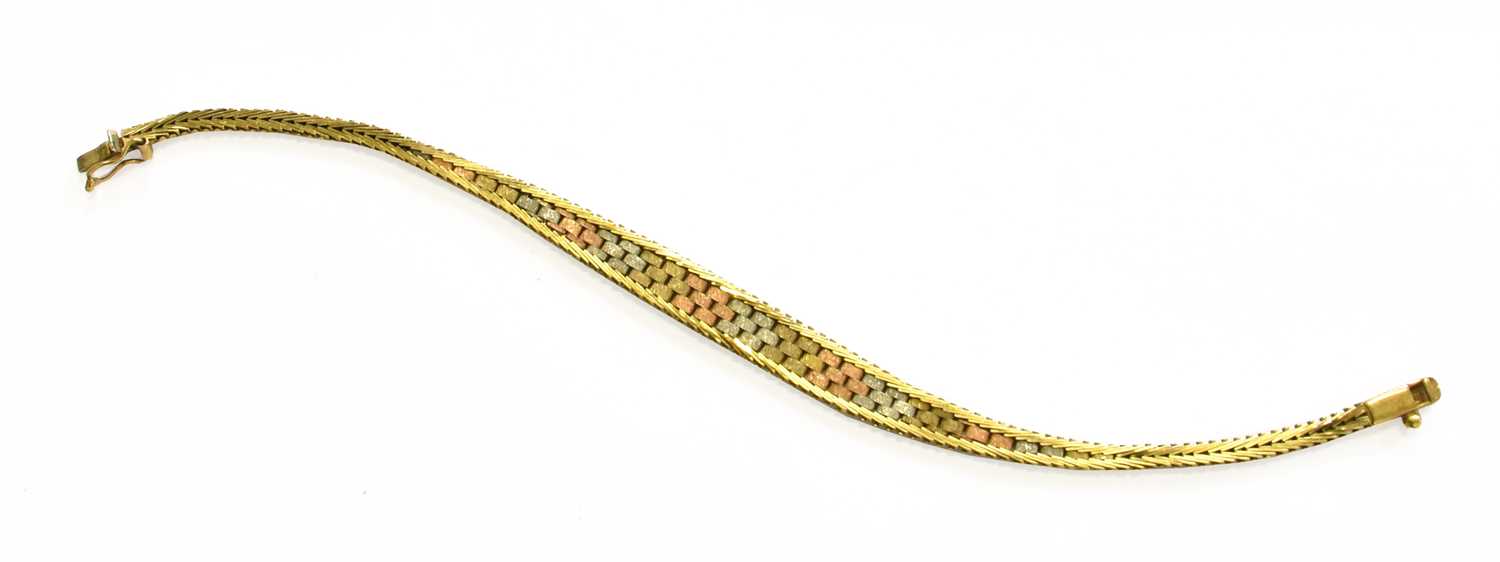 A 9 Carat Tri-Coloured Gold Bracelet, length 18.7cmThe bracelet is in good condition. It fastens