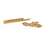 A 9 Carat Gold Tie Clip; and A Brooch, with attached clip stamped '9CT', length 4.6cmTie clip - 6.