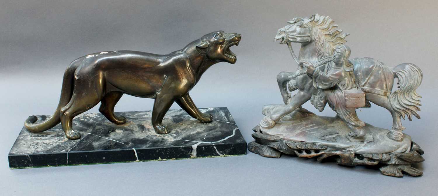 A Chinese Carved Stone Model of a Horse and Figure, 19cm high, on a carved hardwood plinth, together