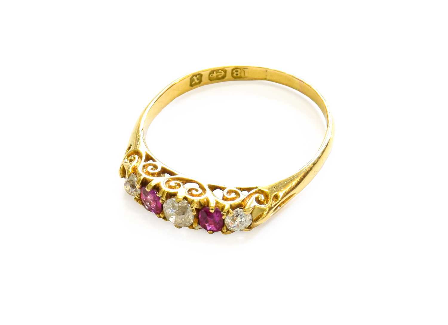 An 18 Carat Gold Ruby and Diamond Five Stone Ring, finger size PThe ring is in good condition. It is