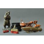 A Brass Figure of a Carp, a brass figure of a bear, a quantity of Diecast vehicles, a wooden model