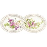 A Pair of Creamware Stands, circa 1800, painted with botanical specimens within pierced borders,