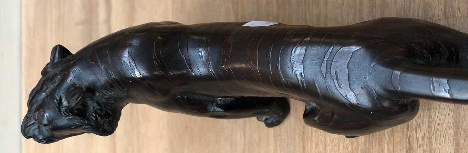 A Japanese Meiji Period Bronze Figure of a Stalking Tiger, on a wooden plinth, 32cm long Missing one - Image 6 of 7