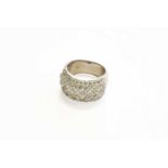 An 18 Carat White Gold Diamond Half Hoop Ring, set throughout with round brilliant cut, baguette cut