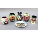 Six Pieces of Contemporary Moorcroft Pottery, including a small 'Queen's Choice' vase, four other