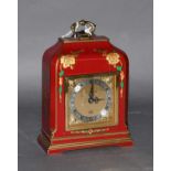 A Red Japanned Mantel Timepiece, dial signed Elliott London, retailed by Mappin & Webb, London, 23cm