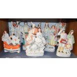 A Collection of Large Victorian Staffordshire Pottery Musical Figures, including a pair of figures