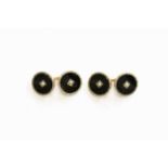 A Pair of Onyx and Split Pearl Cufflinks, formed of chain linked circular onyx plaques with a