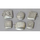 Six Various Silver Vesta-Cases, each oblong, five variously engraved with foliage scrolls, the other