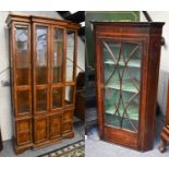 A Modern Oak Veneered Glazed Breakfront Display Cabinet, of slender form, 113cm by 43cm by 201cm,