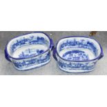 A Pair of Reproduction Pottery Foot Baths, printed in underglaze blue, with landscapes, 47cm wide (