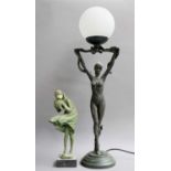 An Art Deco Style Figural Table Lamp, 67cm and An Art Deco Style Resin Figure, of a girl holding a