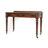 A Victorian Mahogany Writing Table, circa 1870, the moulded top above two frieze drawers with turned