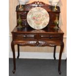 An Early 20th Century Chinese Hardwood Desk with Superstructure, with a cupboard door and two