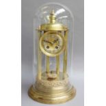 A Striking Mantel Clock, beneath glass dome, circa 1900, 42cm high