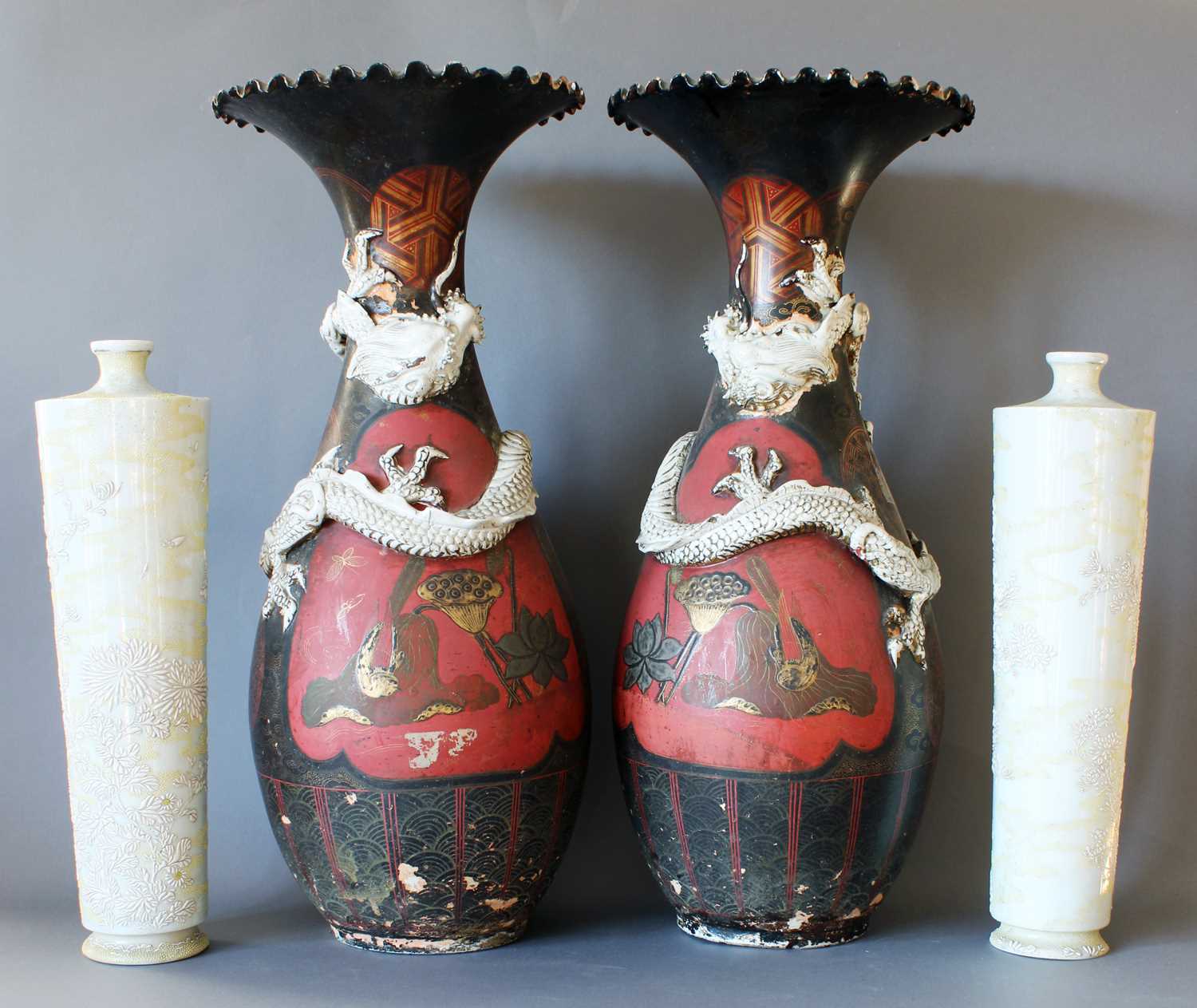 A Pair of Arita Lacquered Porcelain Vases, Meiji period, of baluster form applied with dragons,