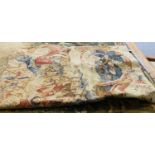 A 17th Century Design Printed Tapestry, depicting Louis XIV going into battle, enclosed by floral
