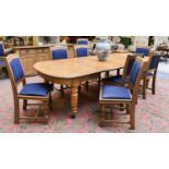 A Victorian Oak Wind Out Dining Table, with three additional leaves, raised on tapering turned and