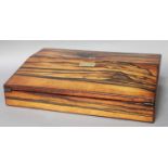 A Victorian Zebra Wood Writing Slope, 38cm by 25cm by 9.25cm Some play in the hinges, leather