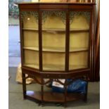 An Arts & Crafts Style Mahogany Cabinet, the three-section glazed front with leaded and coloured