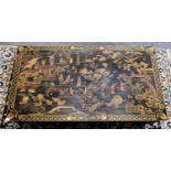A 20th Century Chinese Coffee Table, painted in gilt with figures and animals in an extensive