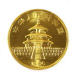 China, Gold 50 Yuan 1986 (.999 gold, approx. 15.55g) obv. Temple of heaven, rev. Panda (KM 134),