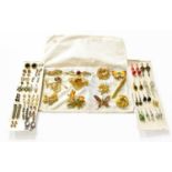 A Quantity of Costume Jewellery, including brooches, earrings, beaded necklaces etc