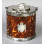 A Victorian Tortoishell Biscuit Barrel, with silver plated mounts, swing handle and knop formed as a