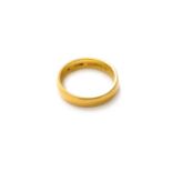 A 22 Carat Gold Band Ring, finger size M1/2Gross weight 5.9 grams.
