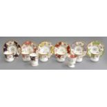 A Coalport Batwing Pattern Harlequin Set of Six Demitasse Cups and Saucers, together with An Egg Cup