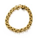 A Fancy Link Bracelet, stamped '18K', length 21cmThe bracelet is in good condition with slight